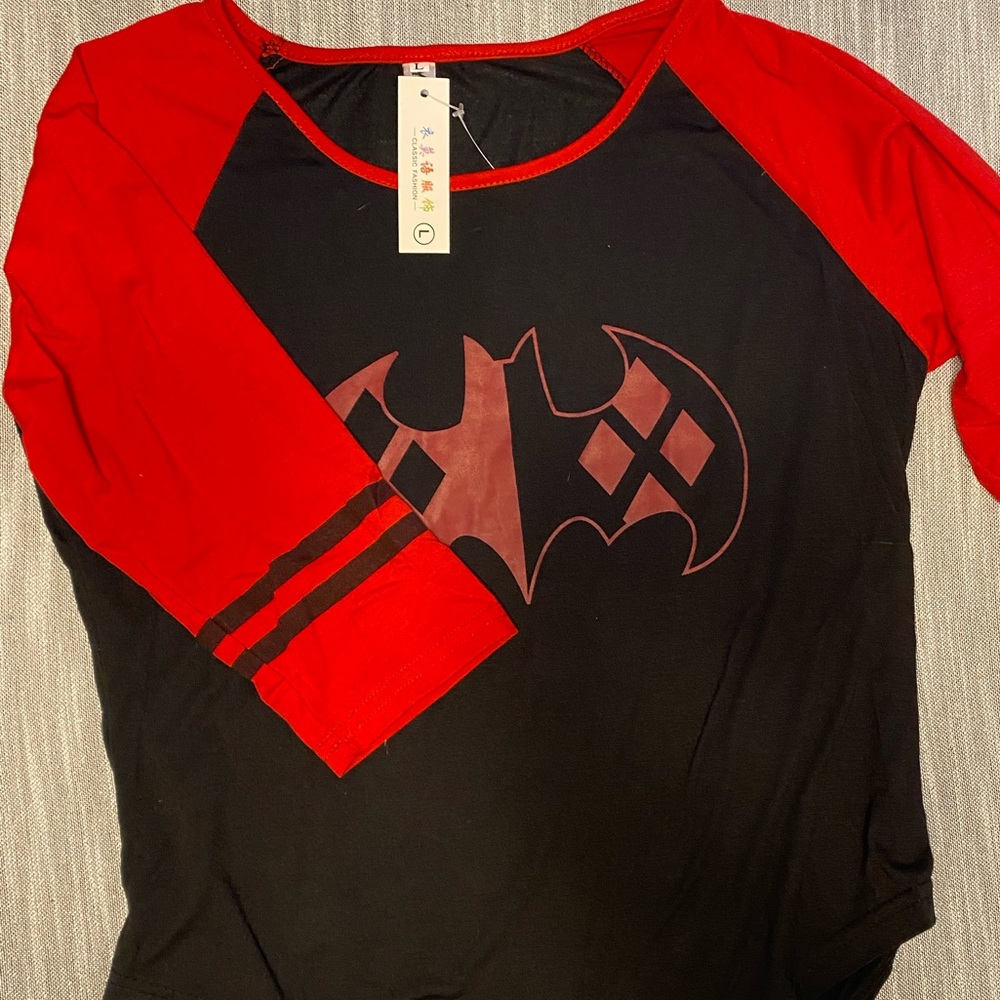 Long sleeve tee would be extra small for ladies or large for kids